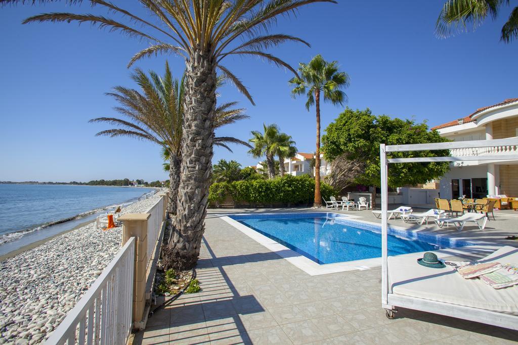 Meneou Beachfront Villa Sunset Pervolia Quarto foto
