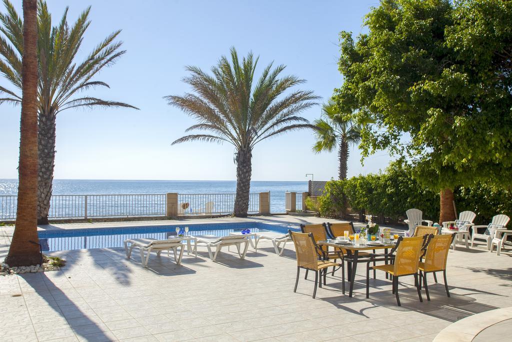 Meneou Beachfront Villa Sunset Pervolia Quarto foto